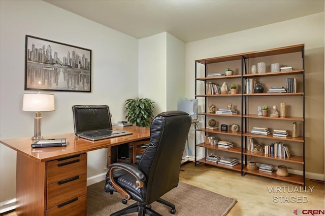 office area with baseboards and light colored carpet