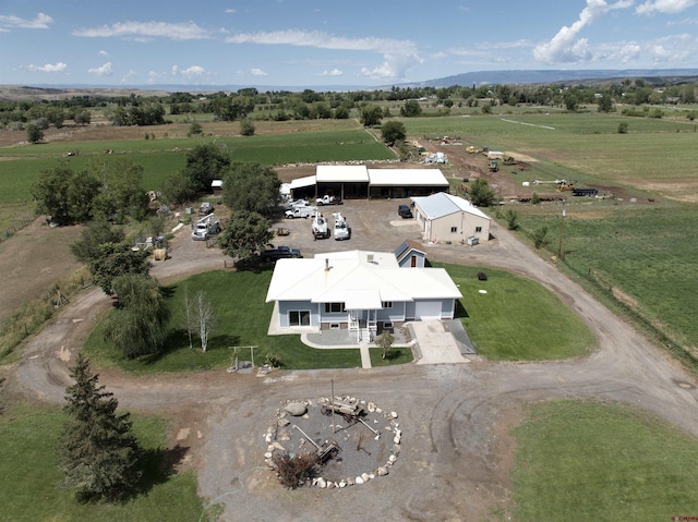 birds eye view of property featuring a rural view