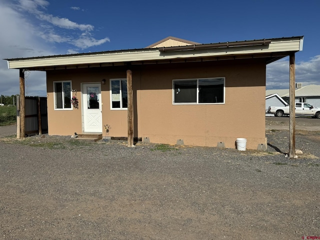 exterior space with stucco siding