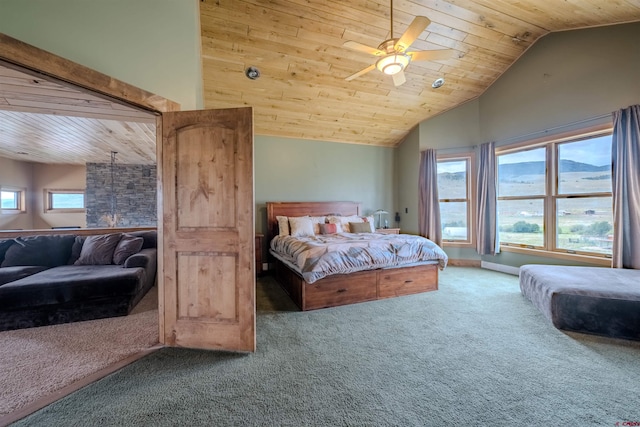 bedroom with ceiling fan, carpet flooring, and wood ceiling