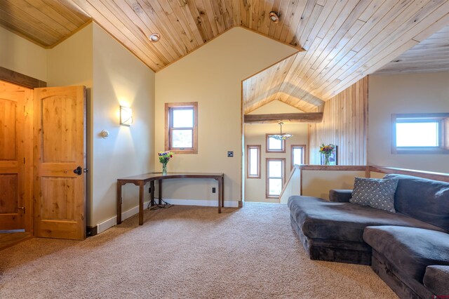 carpeted living room with wooden ceiling