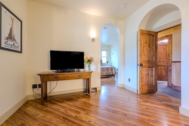 living room with hardwood / wood-style floors