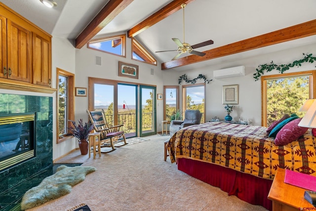 bedroom featuring carpet, a wall mounted AC, beam ceiling, a tiled fireplace, and access to outside