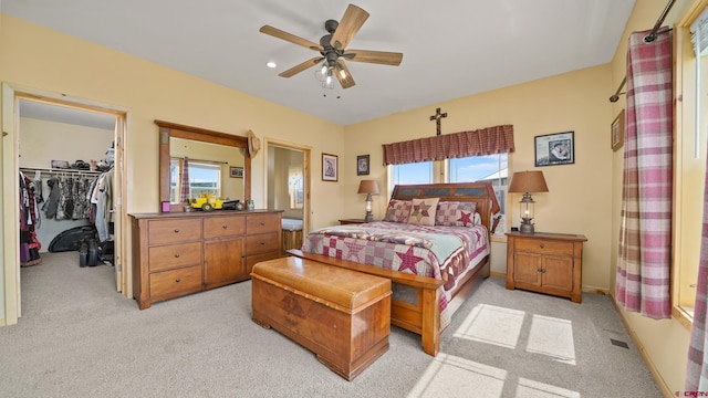 37105 Ii Rd, Redvale, CO 81431 - bedroom with light carpet, a spacious closet, a closet, and a ceiling fan