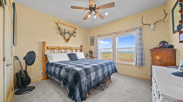37105 Ii Rd, Redvale, CO 81431 - bedroom with light carpet, ceiling fan, and baseboards