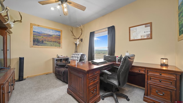 37105 Ii Rd, Redvale, CO 81431 - office area featuring light colored carpet, ceiling fan, and baseboards