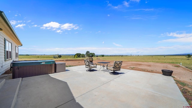 37105 Ii Rd, Redvale, CO 81431 - view of patio / terrace with a hot tub and a rural view