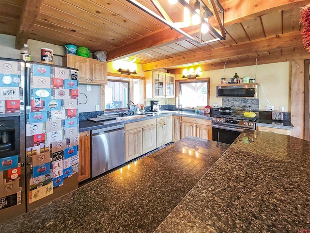 kitchen featuring beamed ceiling, stainless steel appliances, and wood ceiling