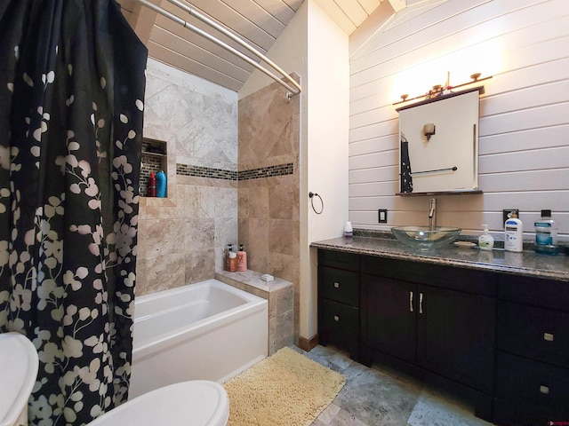 full bathroom with tile patterned flooring, vanity, shower / bathtub combination with curtain, and toilet