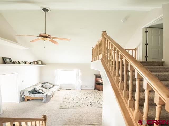 interior space with ceiling fan and high vaulted ceiling