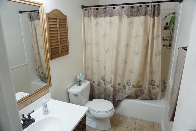 full bathroom with toilet, vanity, shower / bath combo, and tile patterned floors