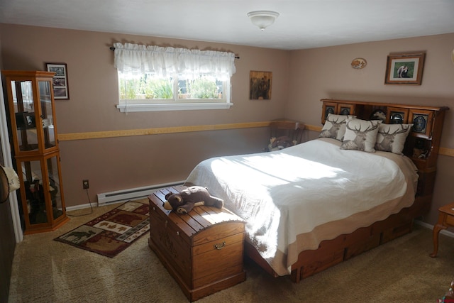 bedroom with carpet floors and a baseboard radiator