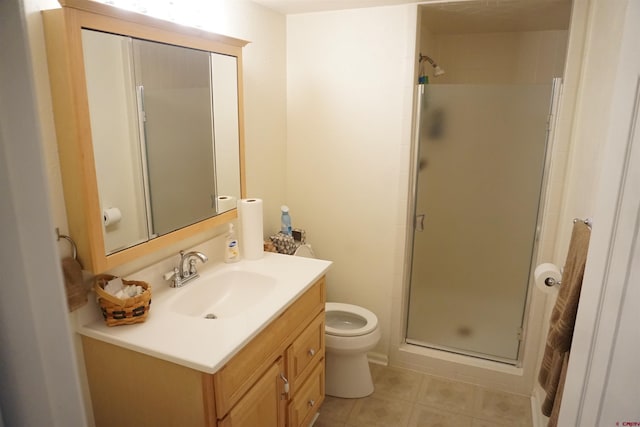 bathroom featuring a shower with shower door, toilet, tile patterned flooring, and vanity