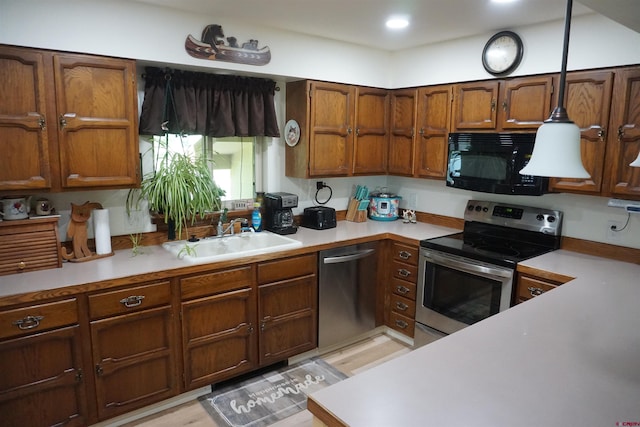 kitchen featuring sink and appliances with stainless steel finishes