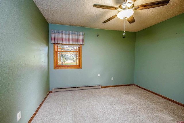 carpeted empty room with ceiling fan, a textured ceiling, and a baseboard heating unit