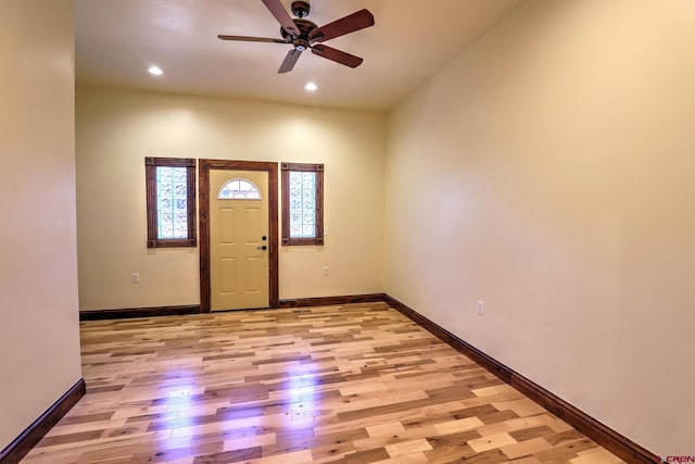 entrance foyer featuring light wood-style floors, recessed lighting, ceiling fan, and baseboards