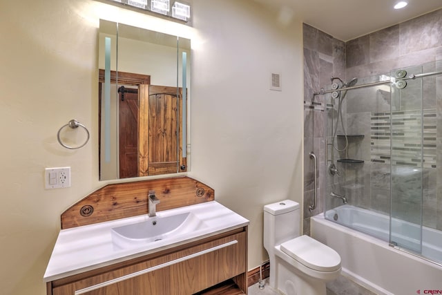 full bathroom featuring visible vents, vanity, toilet, and bath / shower combo with glass door