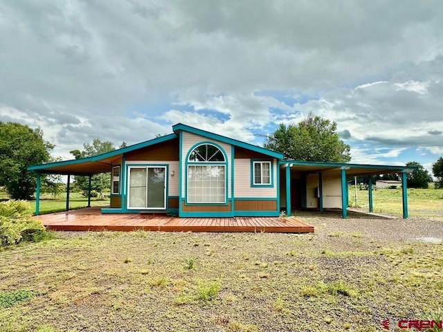 view of front of house with a carport