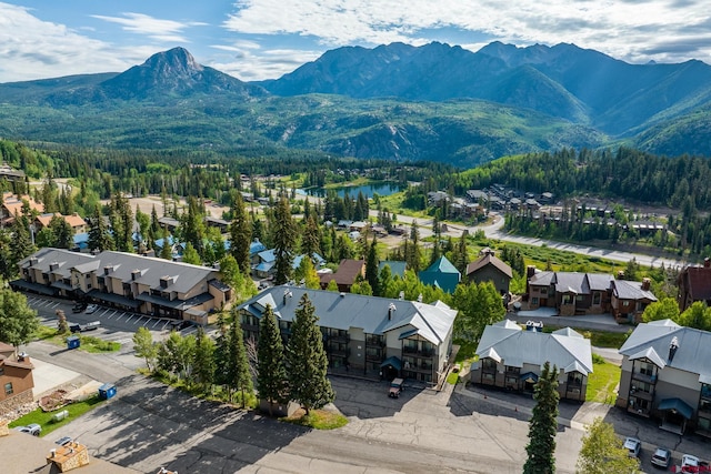 bird's eye view featuring a water and mountain view and a residential view