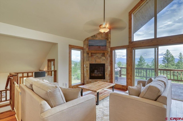 living room featuring light wood-type flooring and a wealth of natural light