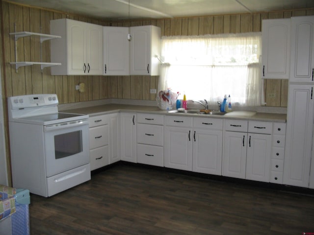 kitchen with dark wood-style flooring, white electric stove, open shelves, white cabinetry, and a sink