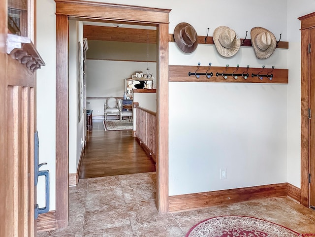 hallway featuring wood-type flooring