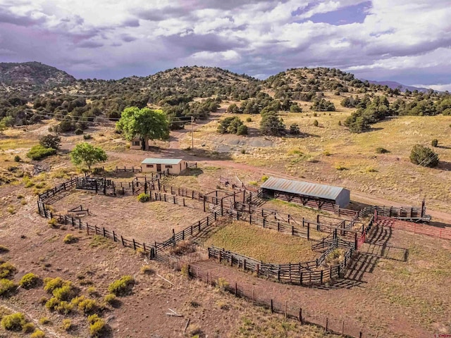 mountain view featuring a rural view