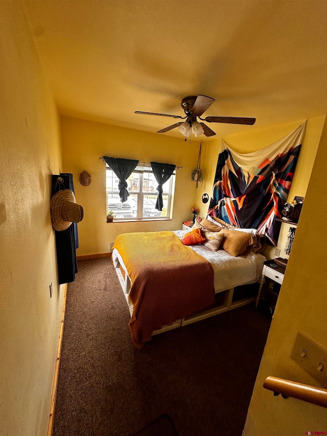 bedroom featuring ceiling fan and carpet flooring