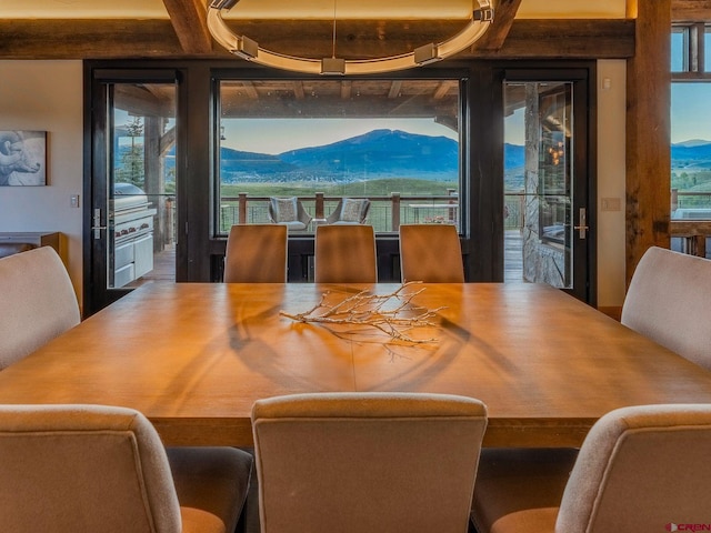 dining area featuring a mountain view