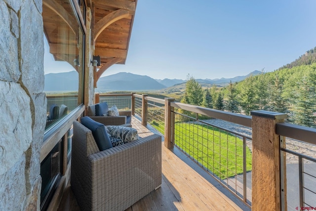 balcony featuring a mountain view