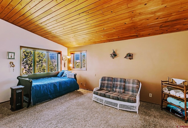 bedroom with wood ceiling, lofted ceiling, and carpet flooring