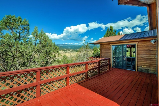 wooden terrace with a mountain view