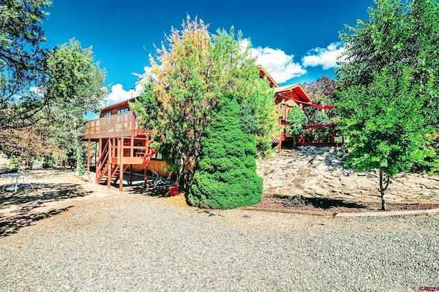 view of yard featuring a deck