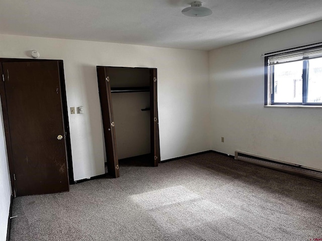 304 N 9th St Unit 5A, Gunnison, CO 81230 - unfurnished bedroom featuring carpet floors and baseboard heating