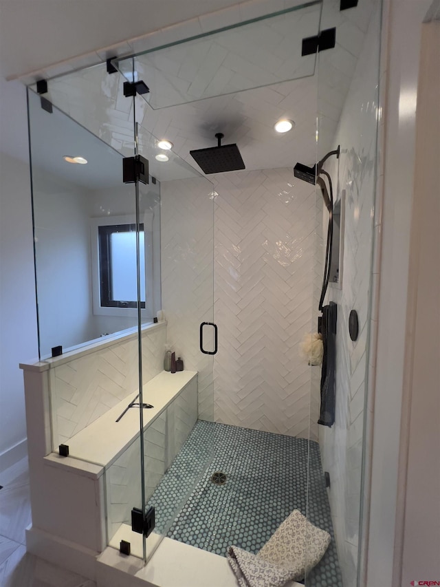 bathroom with recessed lighting and a stall shower