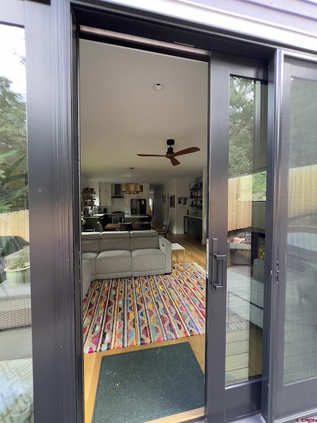 interior space with plenty of natural light and ceiling fan