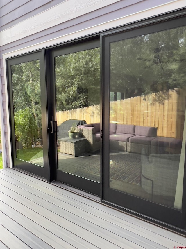 doorway to outside featuring wood finished floors