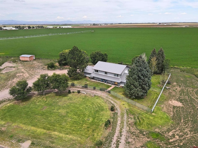 birds eye view of property featuring a rural view