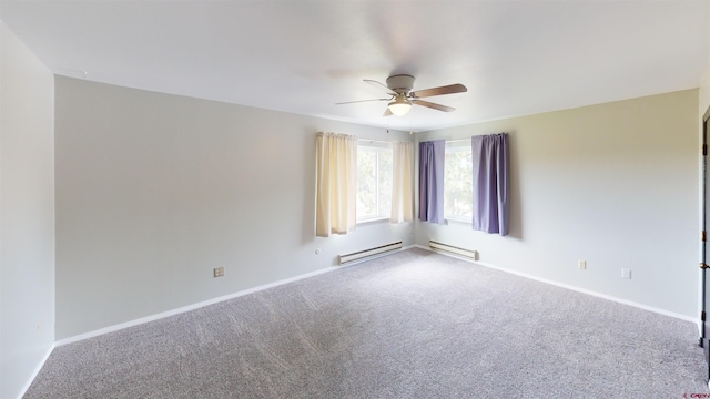 unfurnished room with a baseboard radiator, ceiling fan, and carpet floors