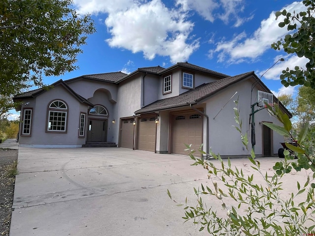 view of front of home with a garage