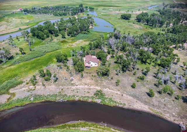 bird's eye view featuring a water view and a rural view