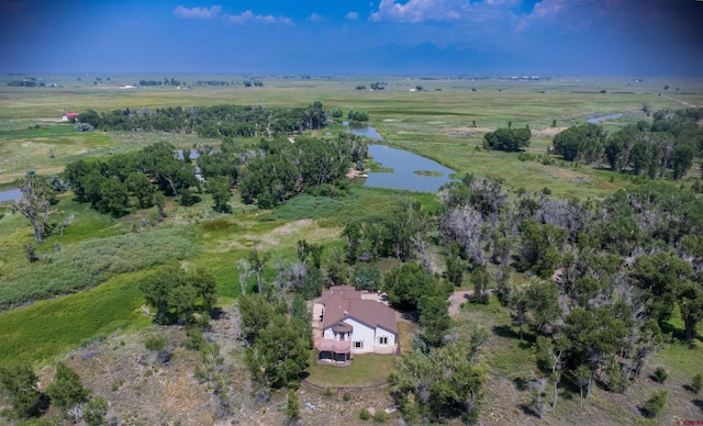 bird's eye view featuring a water view and a rural view