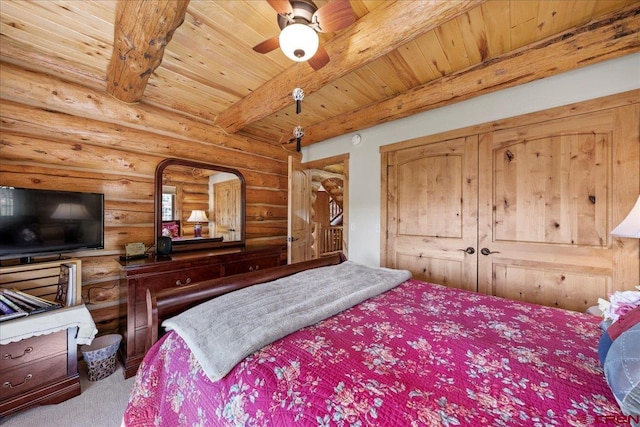 carpeted bedroom featuring log walls, wooden ceiling, a closet, beam ceiling, and ceiling fan