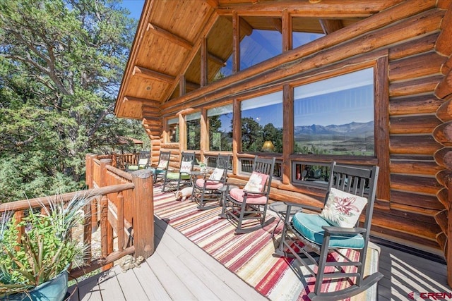 deck with a mountain view