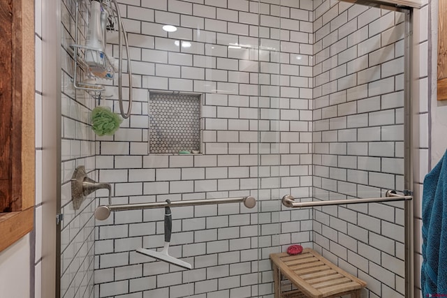 bathroom featuring a shower stall