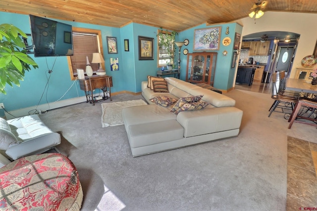 living room with lofted ceiling, wood ceiling, carpet floors, and ceiling fan