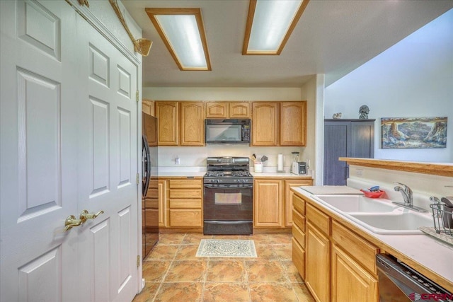 kitchen with black appliances and sink