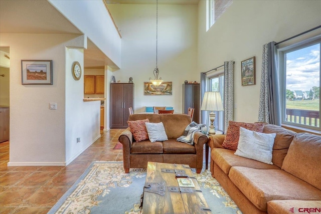 living room with a high ceiling