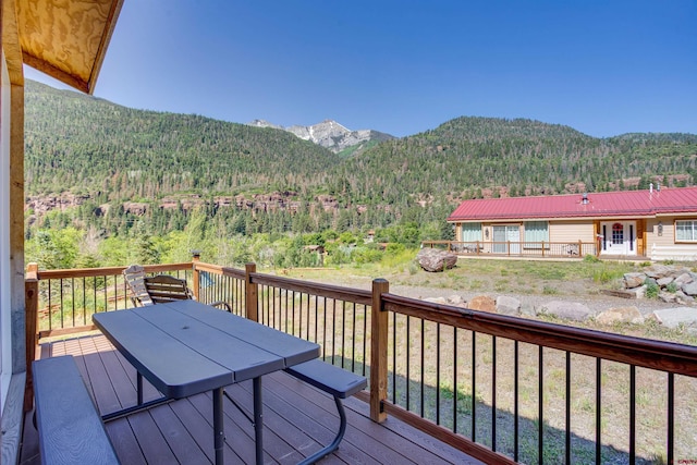 wooden terrace with a mountain view