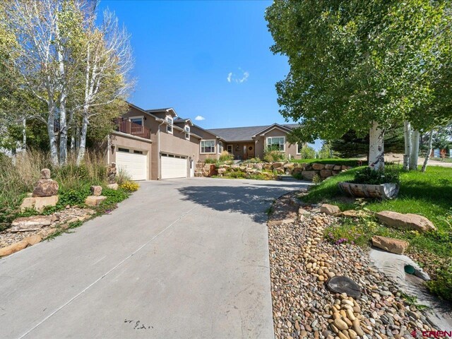 view of front of property with a garage